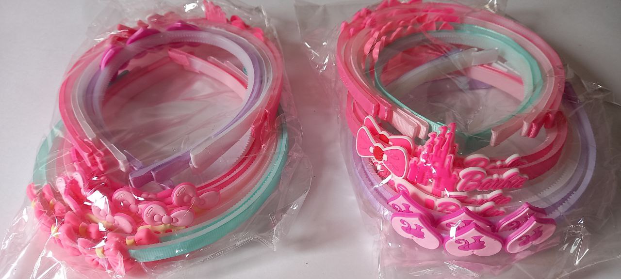 Cintillo de niña plástico (decoración rosa)