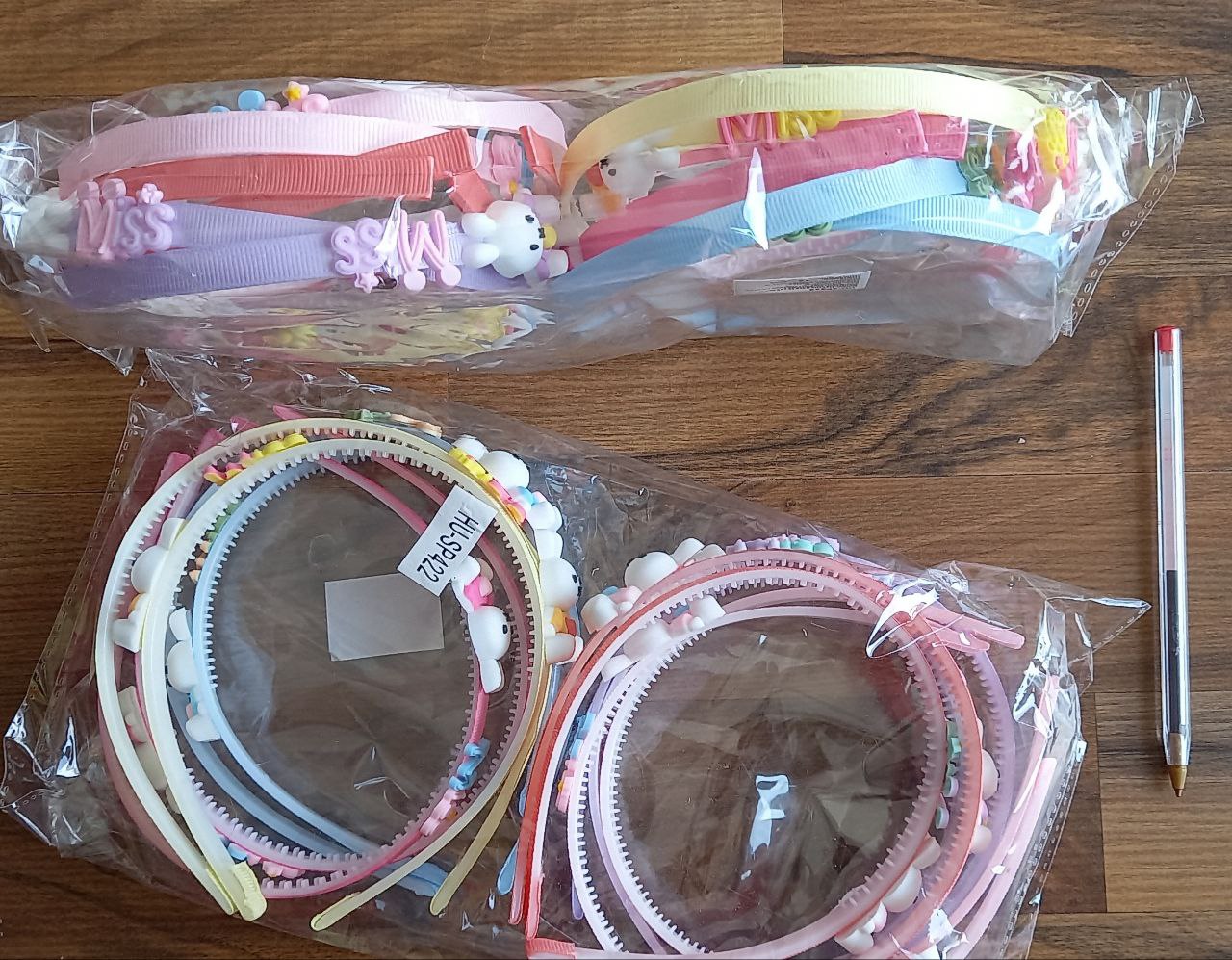 Cintillo plástico niña (paq con 12) 2