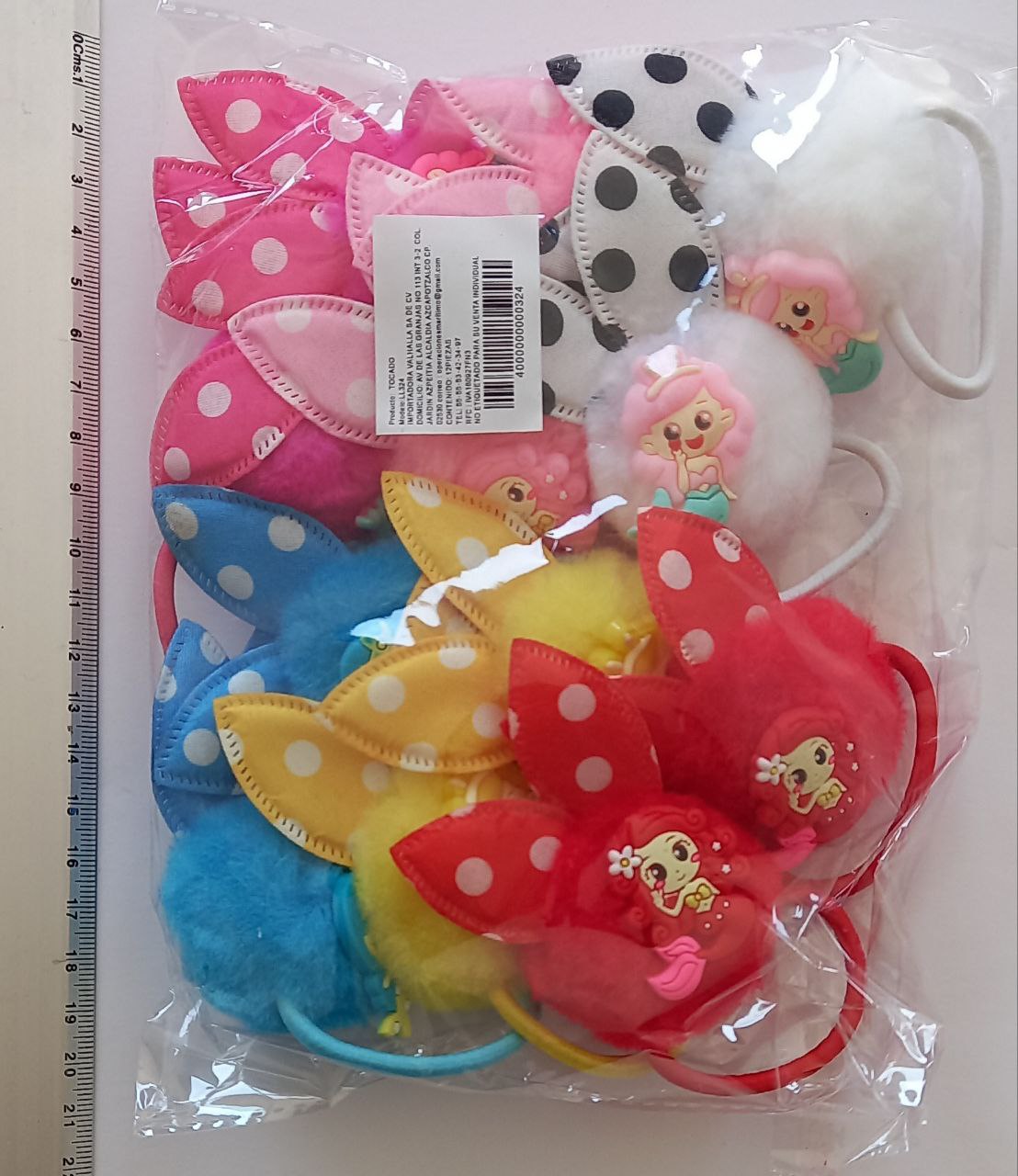 Felpa pompón con lazo