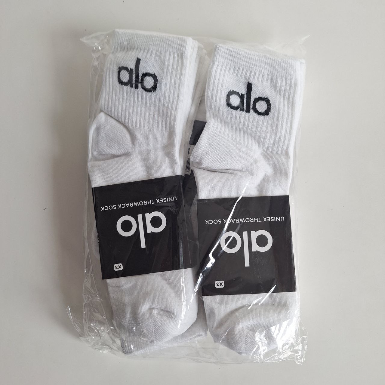 Medias de marca Alta 