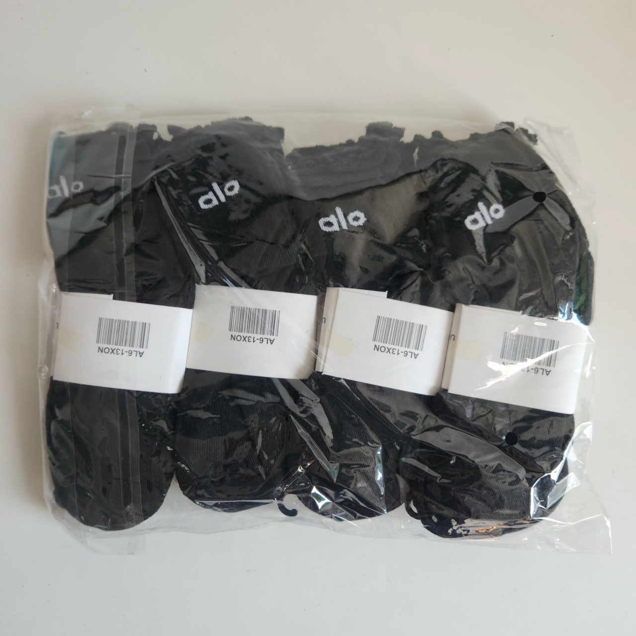 Medias de marca Alta 