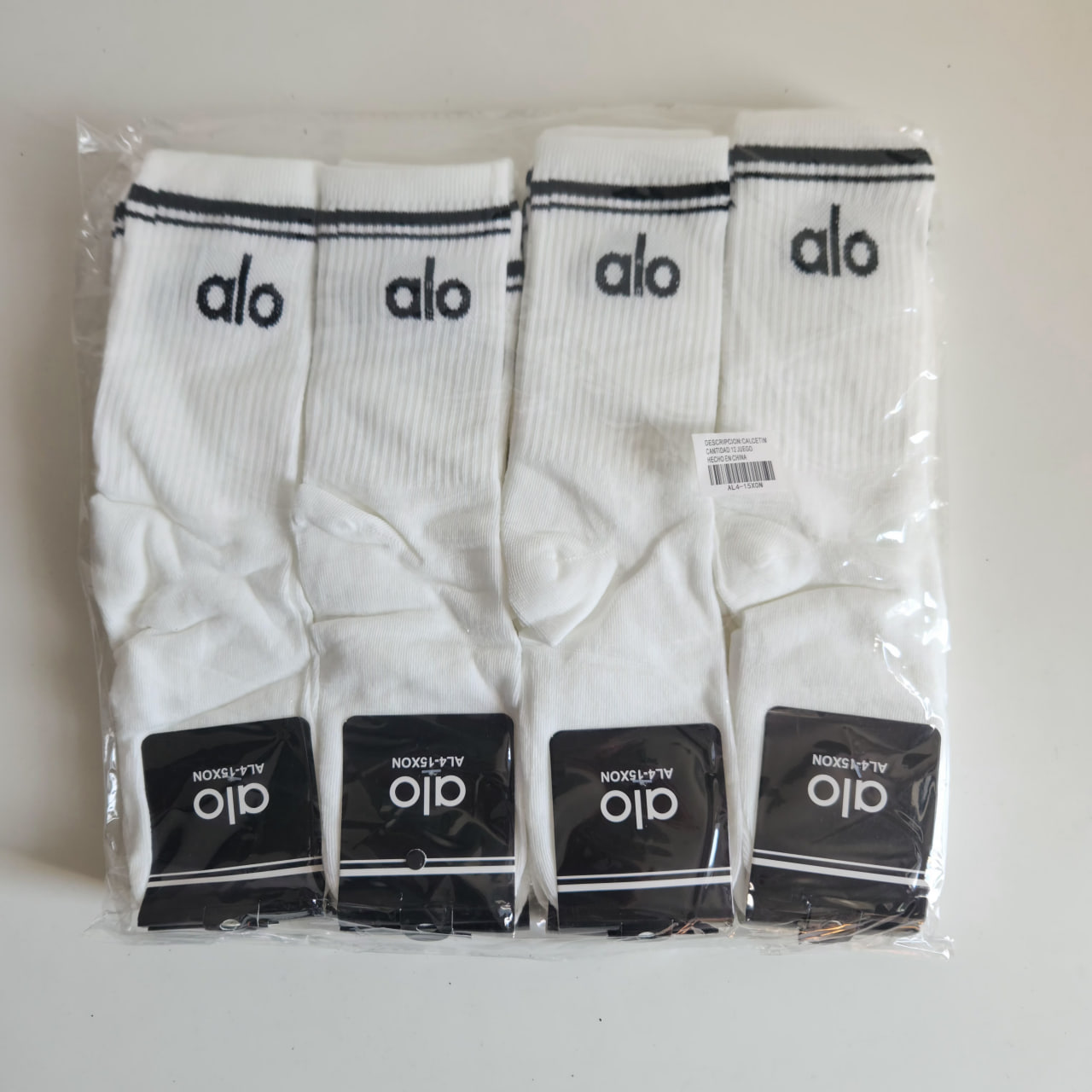 Medias de marca Alta 