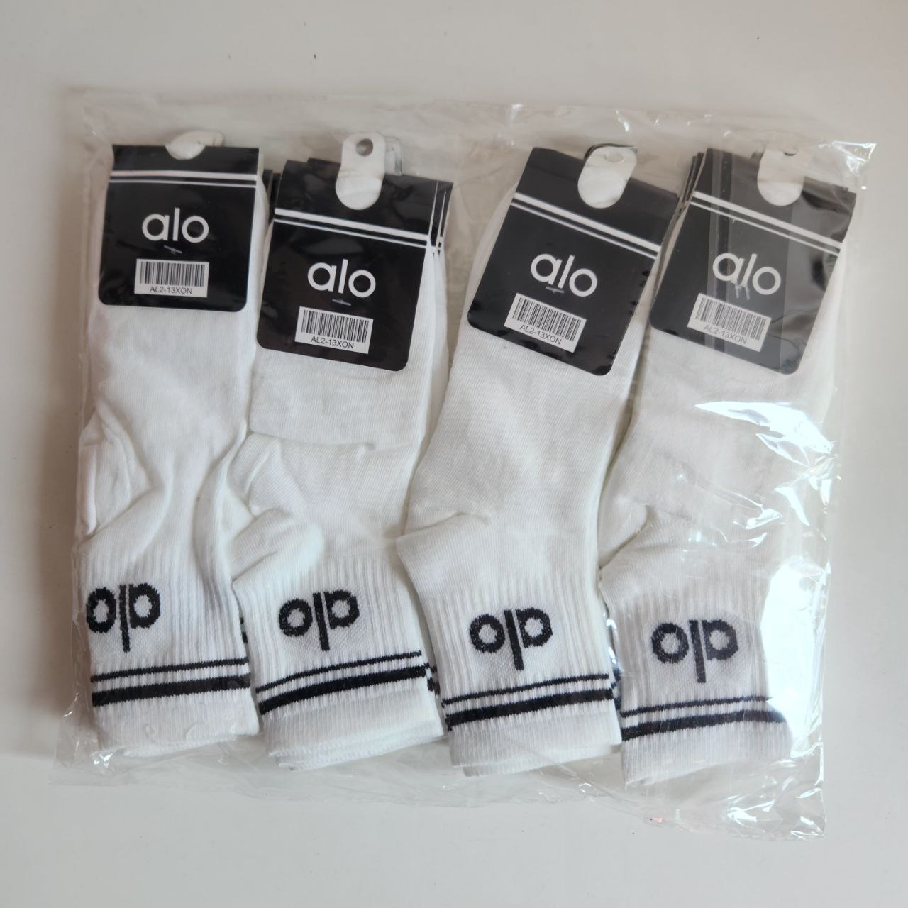 Medias de marca Alta 