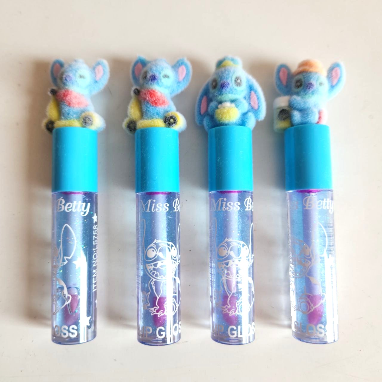 Brillo de Labios  - Stitch, tapa peluche ( caja con 24 )